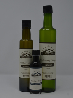 Three bottles of syrup are shown with a bottle labeled " blackberry ginger ".