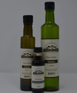 Three bottles of chocolate flavored oil are shown.