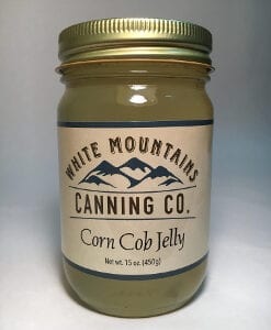 A jar of corn cob jelly is shown.