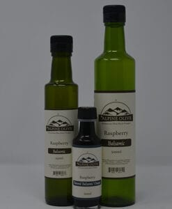 Three bottles of oil are shown with labels.
