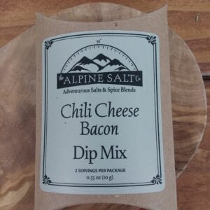 A bag of chili cheese bacon dip mix.