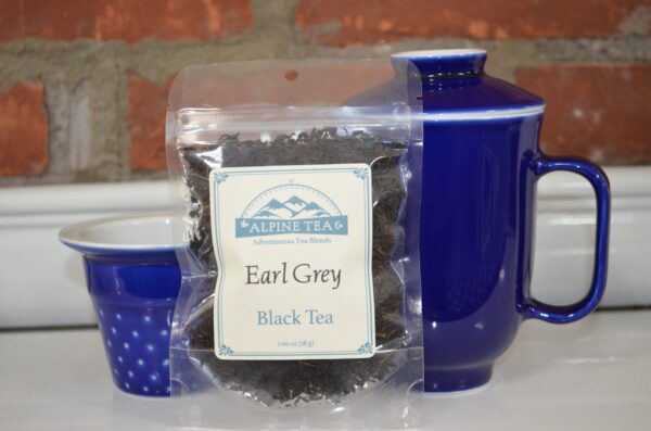 A bag of earl grey tea on top of a table.